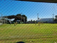 atletas dos dois projetos participaram de um torneio no gramado do quartel da PM